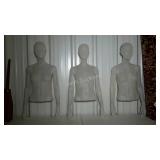 Three lucite style mannequin heads and upper