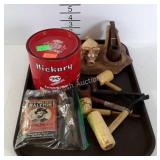 Tobacco tins, pipe stand, and 8 pipes