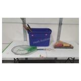 Blue tote with loppers, fish net and safety road