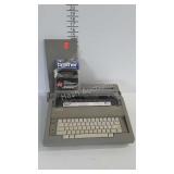 Brother electric typewriter with extra ribbon