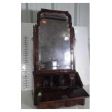 Butlers Mirror, Antique here having the flame
