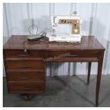 Singer Sewing Machine in Mid Century Cabinet has