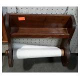 Wall hanging paper towel holder with small shelf.