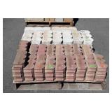 Skid with 50 plus landscape edging pavers