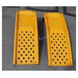 Two metal car ramps