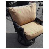 Swivel patio chair with cushions, made by