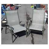 Two metal patio chairs