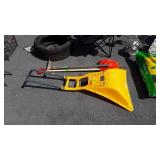 Two snow shovels and pick axe