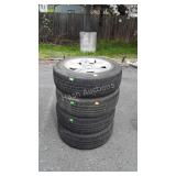 Four mustang wheels with good year tires size