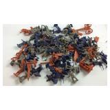 Plastic toy soldiers and cannons