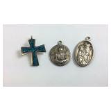 Three Sterling silver religious pendants