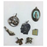 Five Sterling silver charms