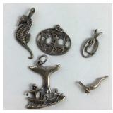 Five Sterling charms