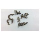 Five Sterling charms