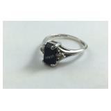 Ring With Black Onyx Like Stone Accented With CZ