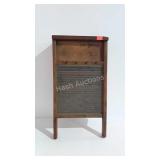 Glass panel washing board repurposed into a