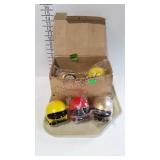 New old store stock, case of 9 coin banks, helmet