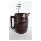 Pottery barrel shaped pitcher