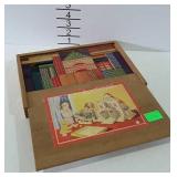 Vintage wood building blocks in wooden storage box