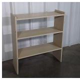 Painted 3 shelf wood made storage shelf. 31x35"