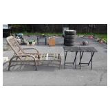 Wicker lounge missing cushion and two tv trays,