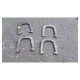 Set of four horse shoes