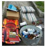 Misc group with patio cushion, sled, saw, etc