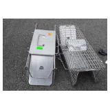 Two small animal traps, seller code L6