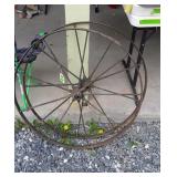 Two wagon wheels 30 inches in diameter
