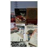 An assortment of cookbooks including microwave