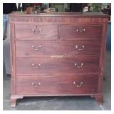 Two over three drawer chest, back leg needs to be