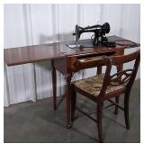 Singer Sewing Machine in Cabinet with Chair