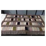 Buggy blanket, hand knotted, shows a little wear,