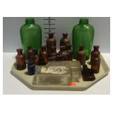 Bottles - green water, brown Lysol, and clear