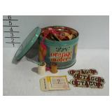 Tin of sewing supplies and premium coupons