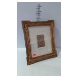 Framed piece of fabric, nice frame that hangs or