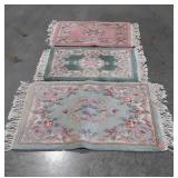 Three Chinese Wool scatter rugs, rugs are okay