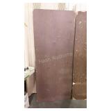 Folding table, six foot, surface shows wear, bit
