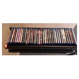 36 Blue Ray Discs, in holding rack,