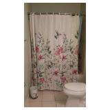 Contents of hallway bathroom. Shower curtain,