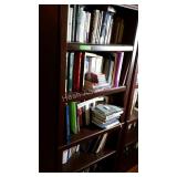 Five shelves of books. Novels, autobiographies,