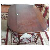 Drop-leaf coffee table. Shows some finish wear.