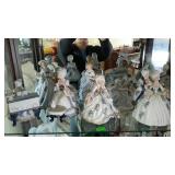 Eight Porcelain Victorian ladies statues. Top