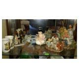 Decor group on fourth shelf. Jesus statues, Betty