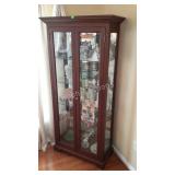 Mirror backed display cabinet. Double glass doors