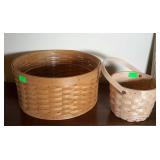 Two Longaberger baskets. Large one with wood