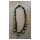 Leather strap of brass jingle bells. 7