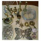 Metal decor group. Candlestick holders, trivets,