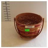 1994 Longaberger jingle bell basket, has plastic