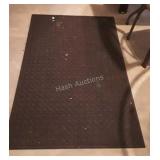 Black rug with square pattern, is 5 foot long by